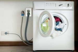 چرا بدنه ماشین لباسشویی برق دارد